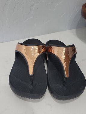 CROCS Black Sandals with Metallic Rose Gold Upper